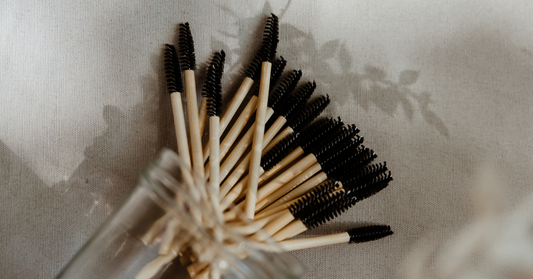 sustainable and compostable mascara wands with bamboo handle. repurposed storage in a mason jar